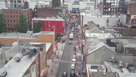 drone shot flying over chinatown in philadelphia