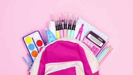 pink school backpack appear on pink theme and school tools come out. stop motion