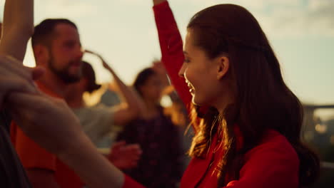 Happy-couple-dancing-in-urban-background.-People-having-fun-at-rooftop-party.