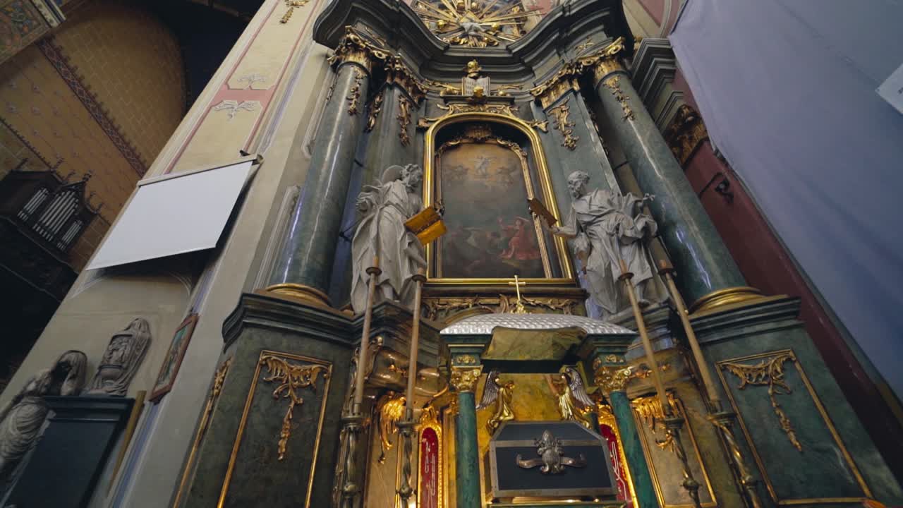 Interior of the Church of the Assumption of the Blessed Virgin Mary with high iconostasis and colorful frescoes