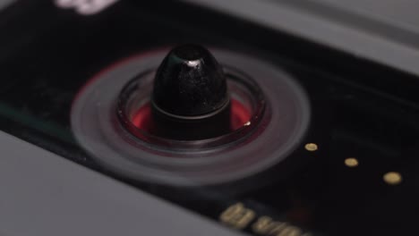 rewinding audio cassette tape, macro close up