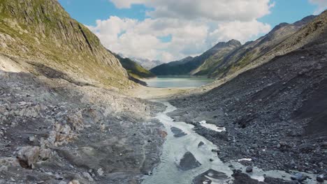 Swiss-dam-with-a-lake-and-a-blue-sky