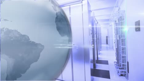 animation of rotating globe and moving lens flares over data server room