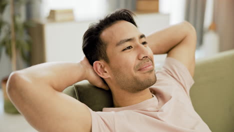 man relaxing on a sofa