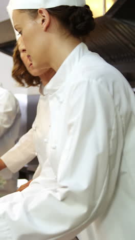 team of chef cleaning the kitchen