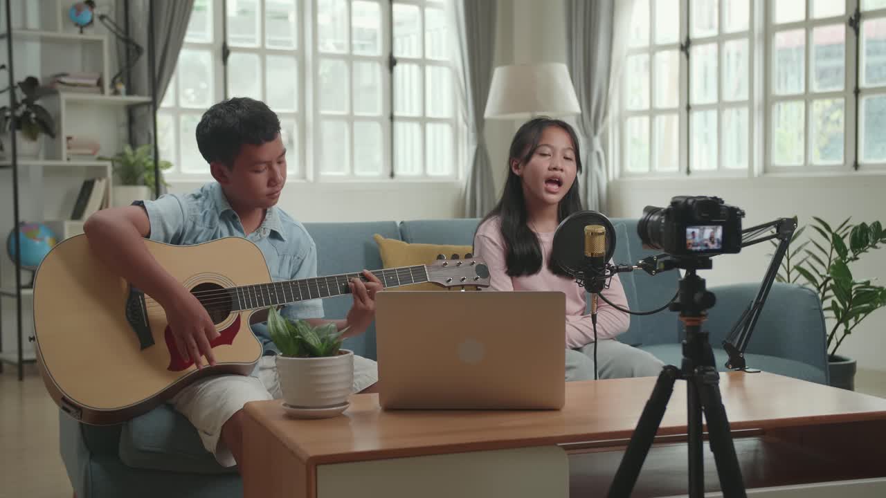 Kids Singing and Playing Guitar at Home