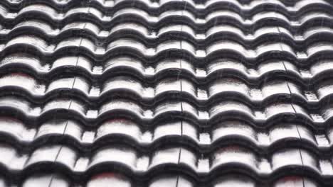 raindrops on the roof of the house made of tile