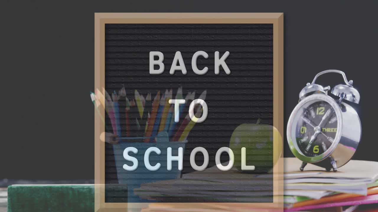 volver al texto de la escuela en la pizarra contra la paleta de colores y el icono de instrumentos geométricos