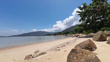 Time-lapse sequence at Lamai Beach, Koh Samui, Thailand, capturing the sandy coastline, turquoise ocean, and fast-moving clouds in a tropical seascape
