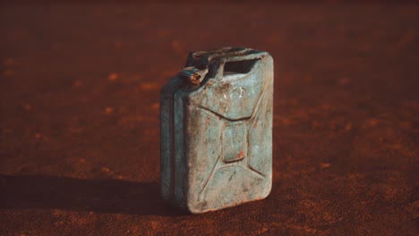 old rusty fuel canister in the desert