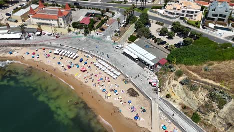 Aerial View of a Beach with People and Buildings