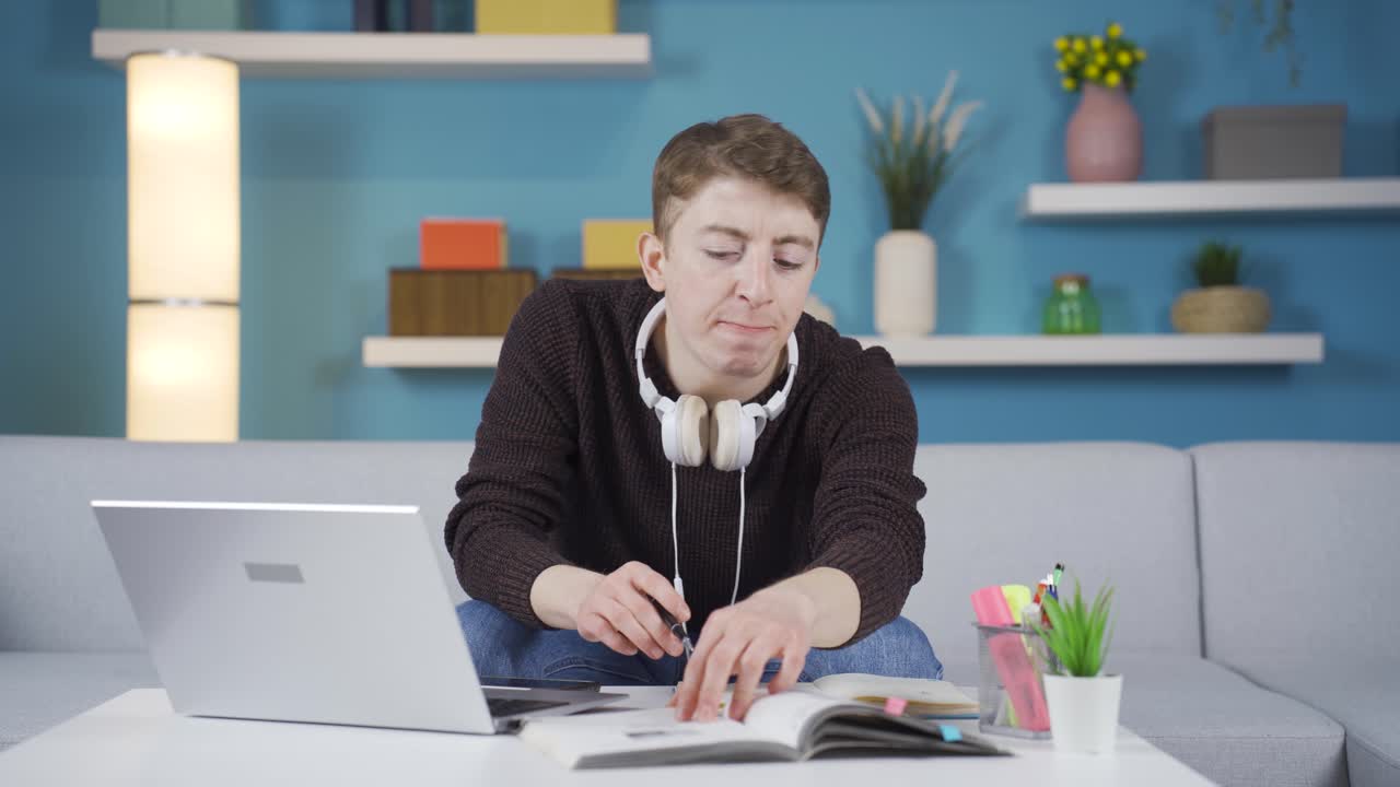 Student doing homework at home.