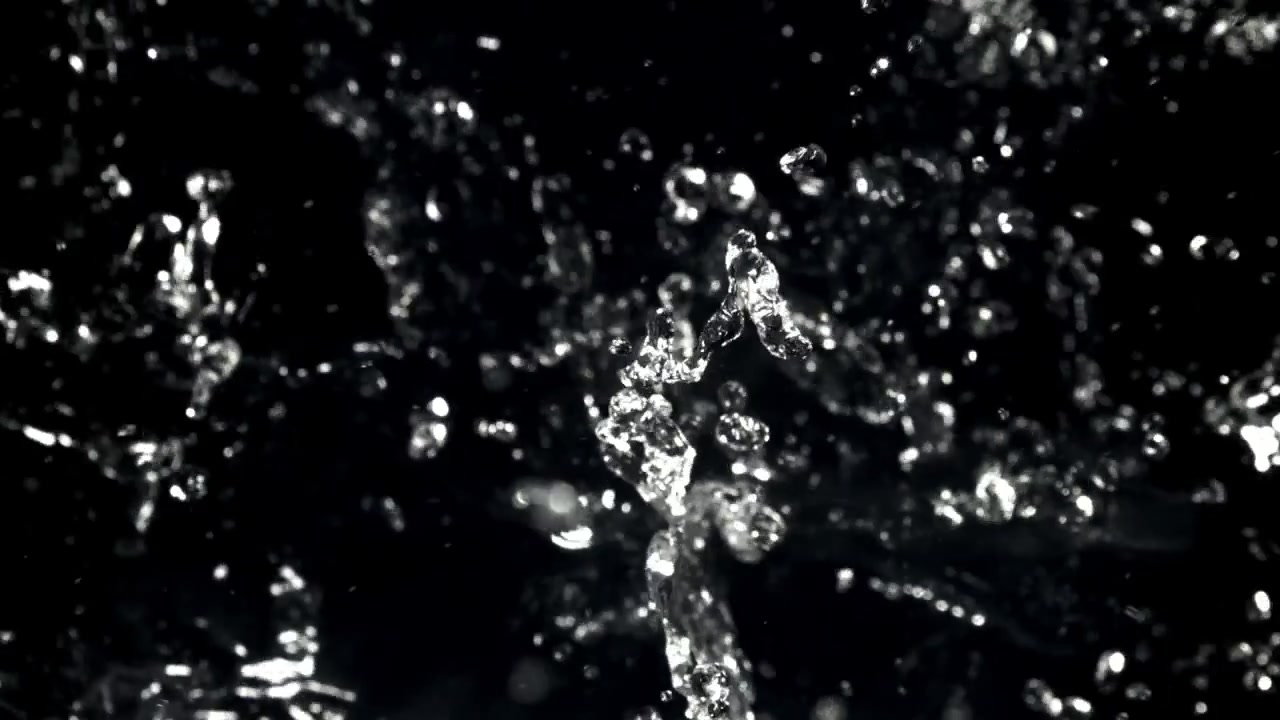 Slow Motion Water Droplets and Splashes on Black Background