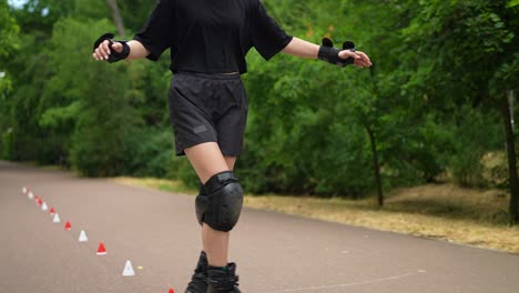 girl rollerblading in park