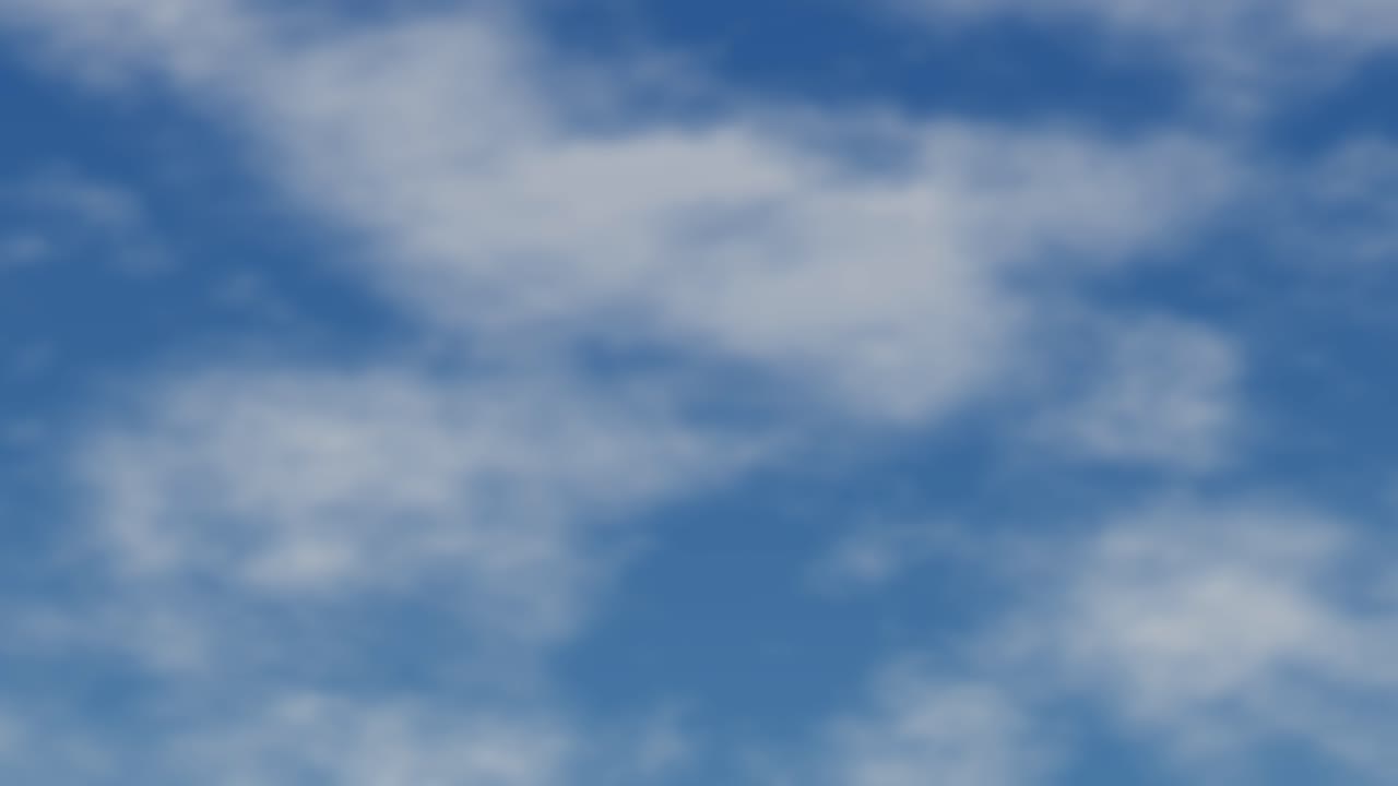 Soft white clouds drift slowly across a bright blue sky in this organic background animation