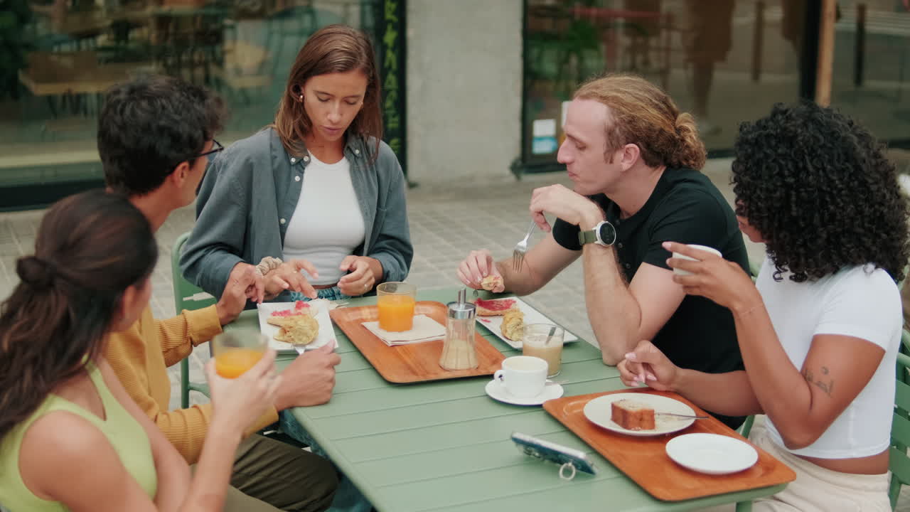 Lunch communication. Students are having a lively conversation. Top view