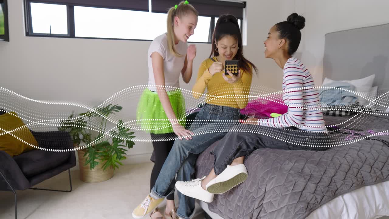 Three women entering bedroom, waving and opening makeup compact, applying beauty products, bonding