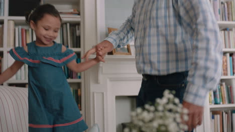 happy-grandfather-dancing-with-little-girl-at-home-grandpa-having-fun-dance-with-granddaughter-celebrating-family-weekend-together-4k-footage