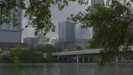 austin, texas skyline pan down to lady bird lake