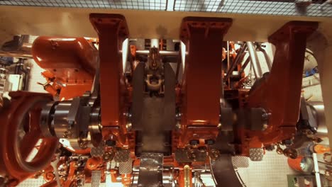 moving pistons, part of the engine of steam boat lotschberg