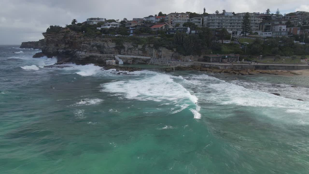 Waves Crashing On The Sea Wall Of Bronte Baths