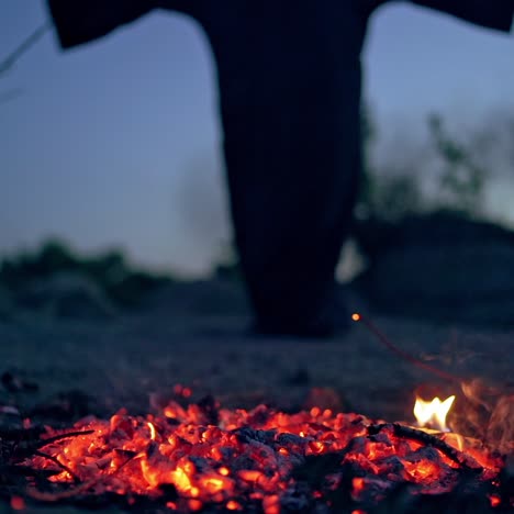 witch in black near bonfire