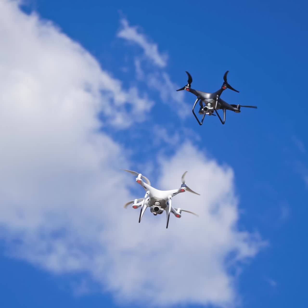 Drones hovering across the sky