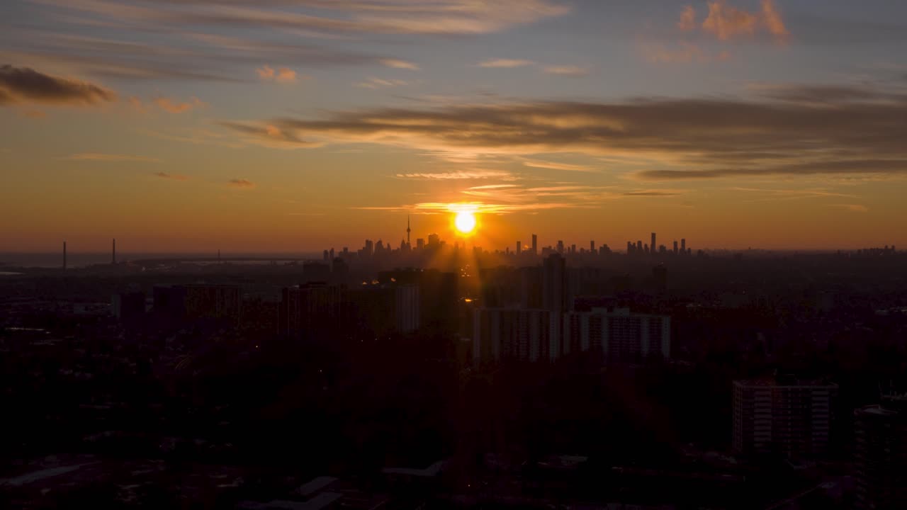 Aerial Timelapse-Hyperlapse of Toronto Skyline at Sunset-Sunrise.Camera Movement: Dolly Forwards.