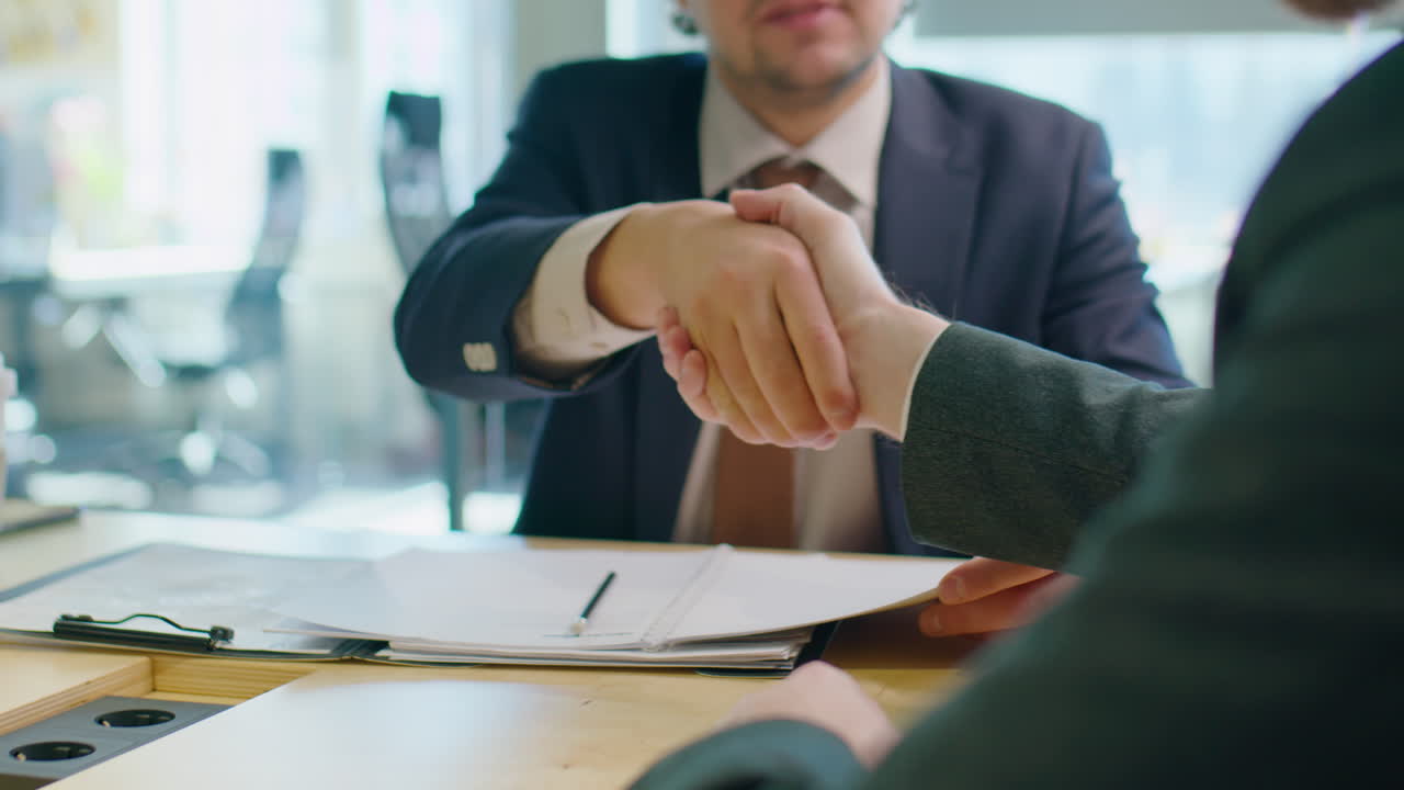 Business Partners Shaking Hands on Meeting