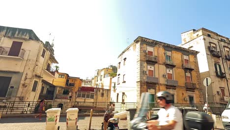 urban street view with moving vehicles and buildings