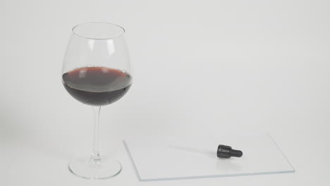 technician collects a sample of wine for analysis 4k 25p