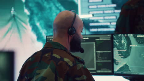 male it specialist operating on reconnaissance system to transmit real time data