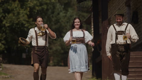 people in traditional clothing celebrating oktoberfest