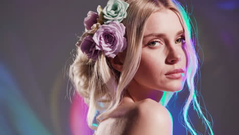 portraits of a woman with floral embellishments and vibrant lighting