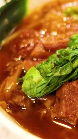 delicious stewed meat noodles with greens and drink