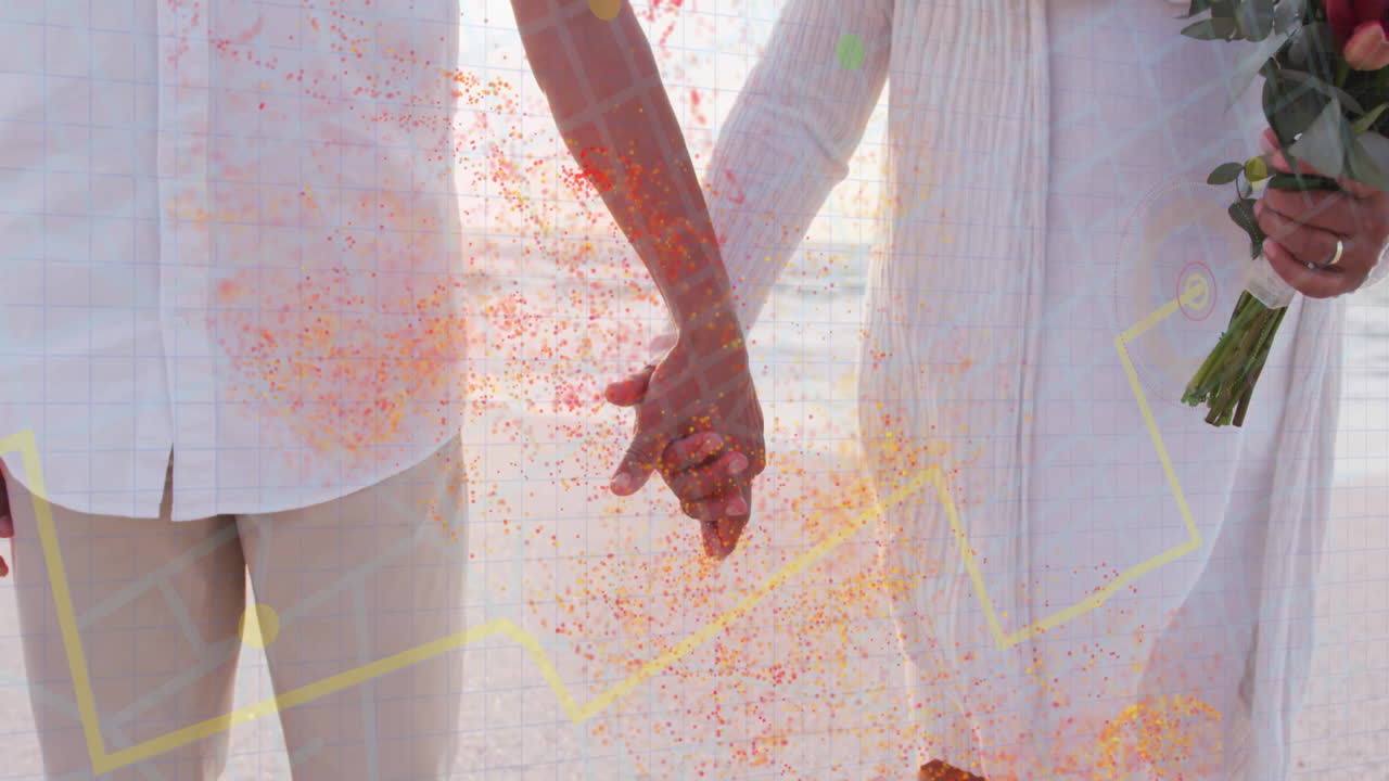 Holding hands, couple viewing animation of financial data with colorful particles