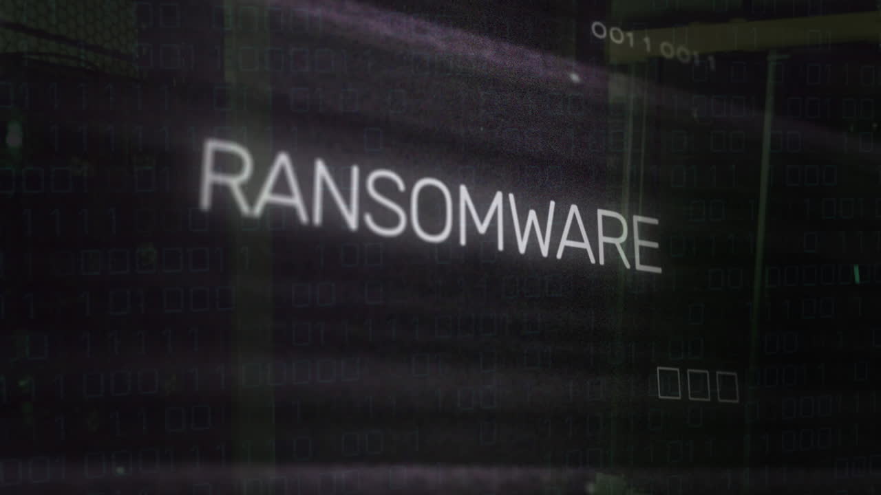 Animation of ransomware text over motherboard and data processing