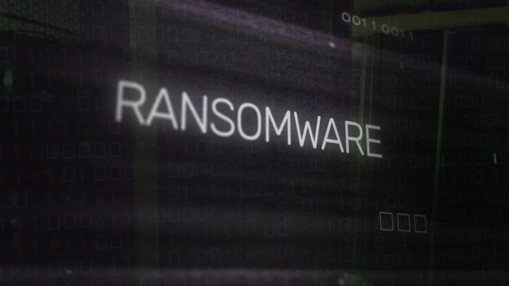 Animation of ransomware text over motherboard and data processing
