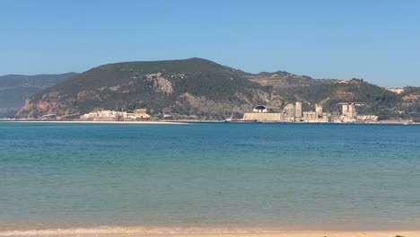 Tropical-white-sand-amazing-beach-view-with-blue-ocean-waves-on-the-shore