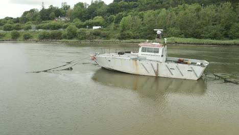 Shipwreck-Docked-On-The-River-Tohrig-At-Youghal-In-County-Cork,-Ireland