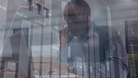 animation of financial data and graphs moving over african american man using smartphone and laptop