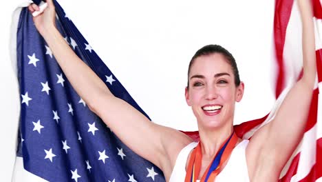 happy athlete holding american flag