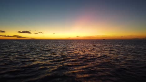 waves and sunset in aruba