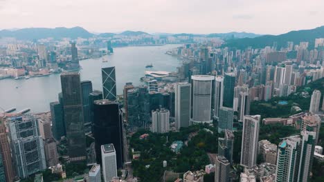 aerial view of tall skyscrapers of downtown in hong kong during daytime.