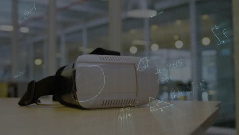 Animation-of-mathematical-equations-over-vr-headset-on-table