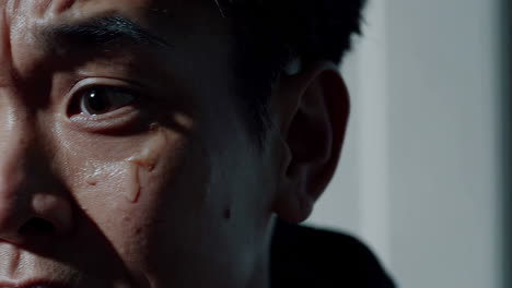 close-up of a distressed man