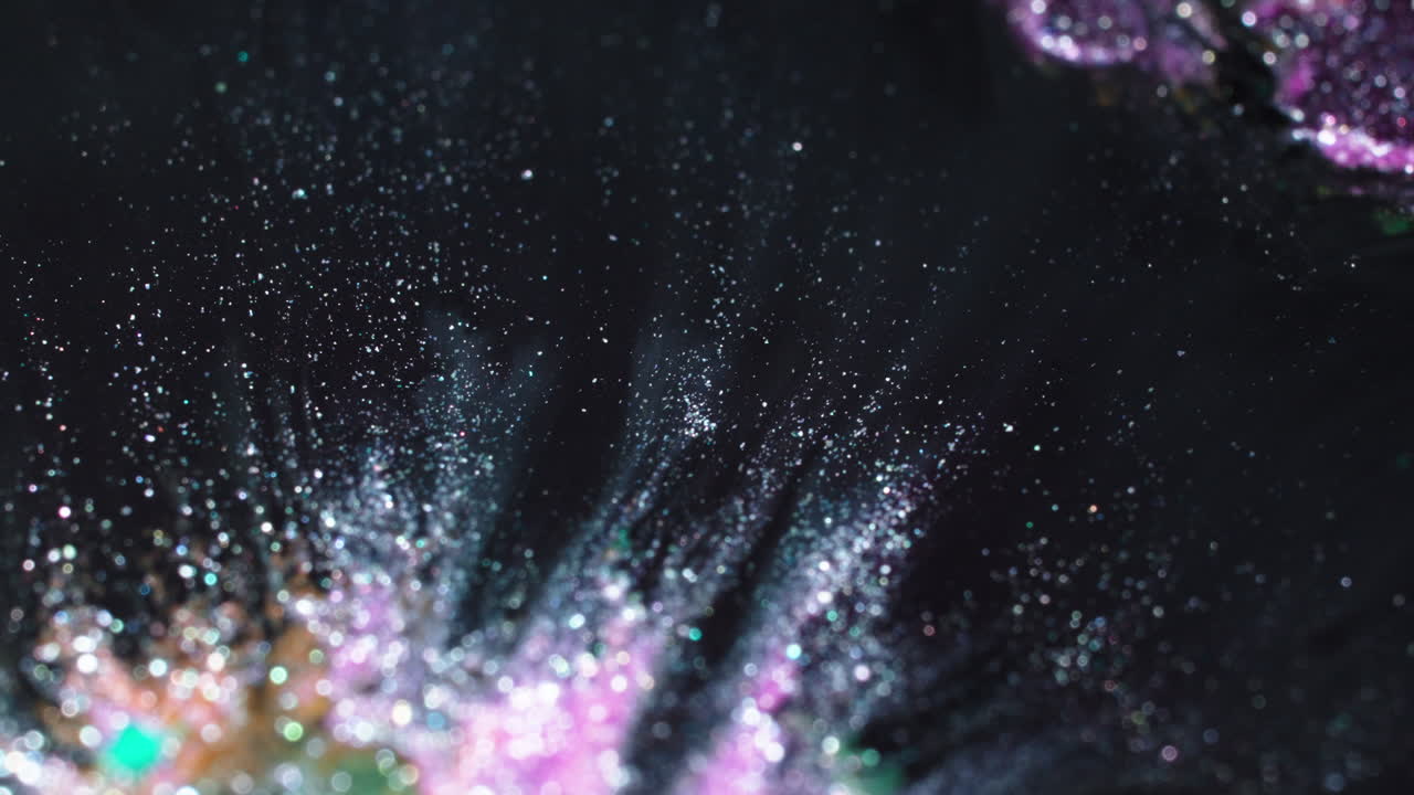 Macro shot of colorful substances mixing with artistic flair