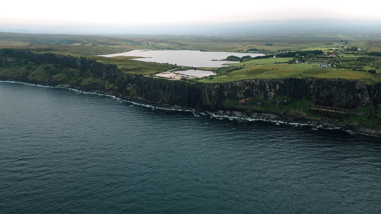 Dramatic Cliffs and Loch of the Isle of Skye