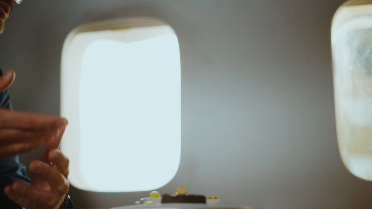 Businessmen shaking hands on a private jet