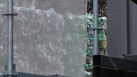 deposit of compressed bottles cubes in the recycling company